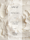 A close-up texture shot of whipped cream with a semi-transparent vertical label reading 'notes of: PISTACHIO COCONUT CREAM VANILLA MUSK' in black text.
