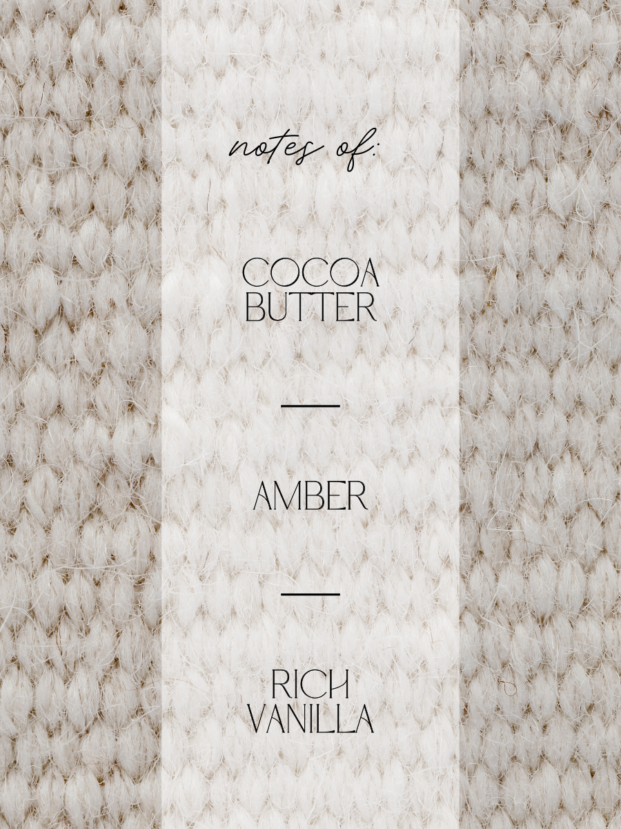 A close-up texture panel with a cream-colored vertical center band reading 'notes of: COCOA BUTTER AMBER RICH VANILLA' in black text, flanked by warm beige and cream marbled knit-like textures.